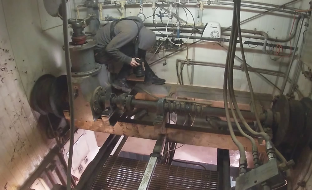 Investigator filming from above the gas chamber